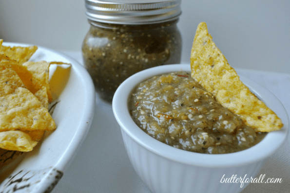 Tomatillo salsa served with corn tortilla chips. 