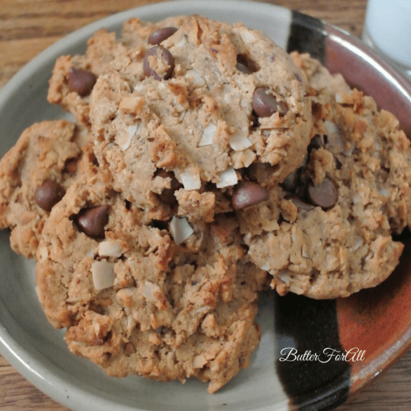 Plate of stacked, fresh almond coconut cookies.