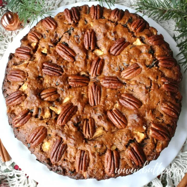 A beautiful big fruit cake studded with nuts and served o Christmas Day.