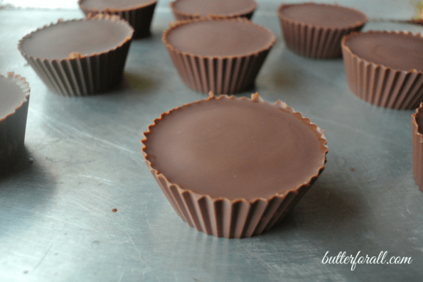 Ready-to-eat peanut butter cups on a baking sheet.