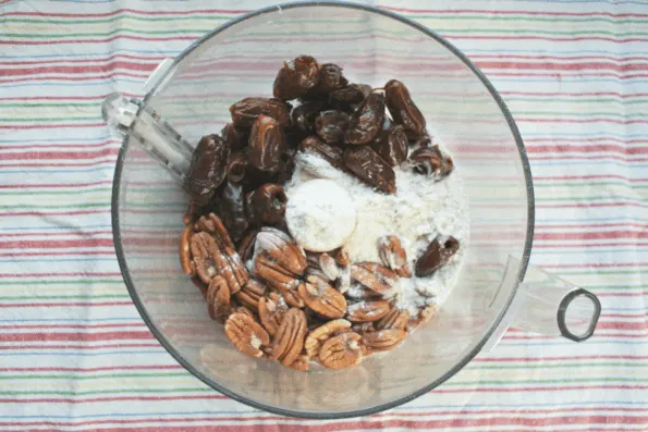 A bowl of dates and pecans.
