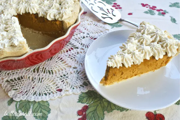 A slice of winter squash pie on a plate.
