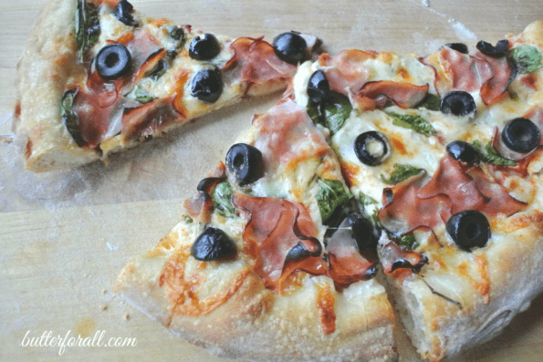 Slices of baked sourdough pizza.