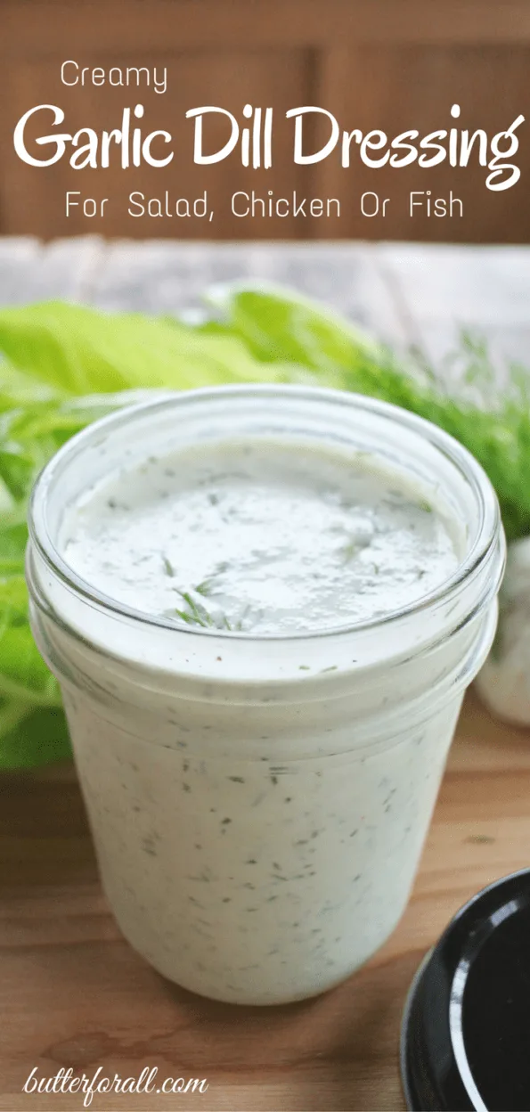 Creamy garlic dill dressing in a jar with text overlay.