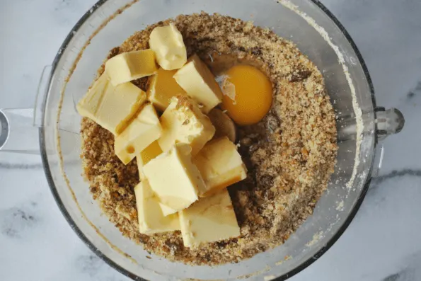 Wet ingredients being added to the mixing bowl.