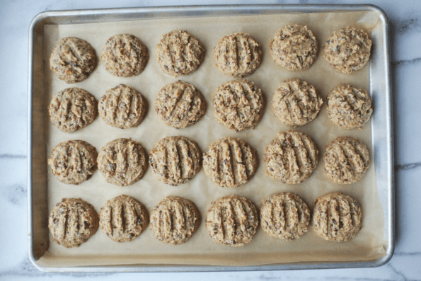 Baked cookies on a sheet.