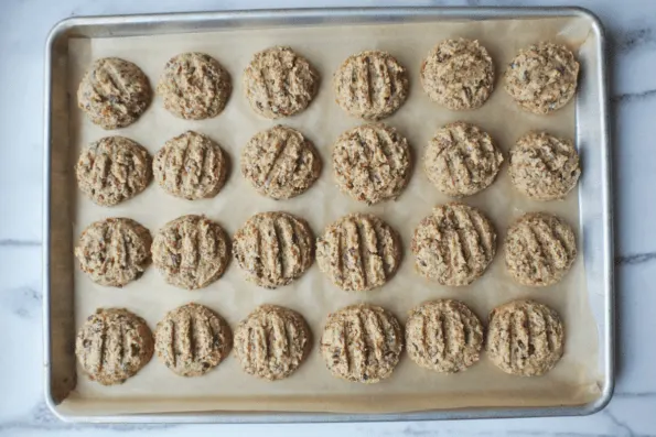 Baked cookies on a sheet.