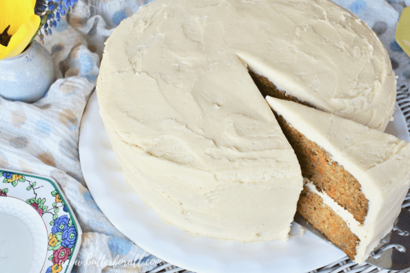 A close-up of delicious carrot cake sweetened with earthy dates and spiced with cardamom.