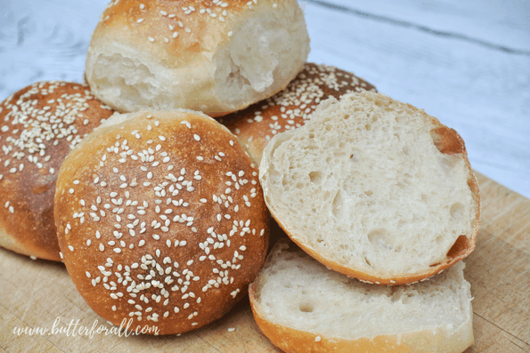 A close-up of stacked burger buns.