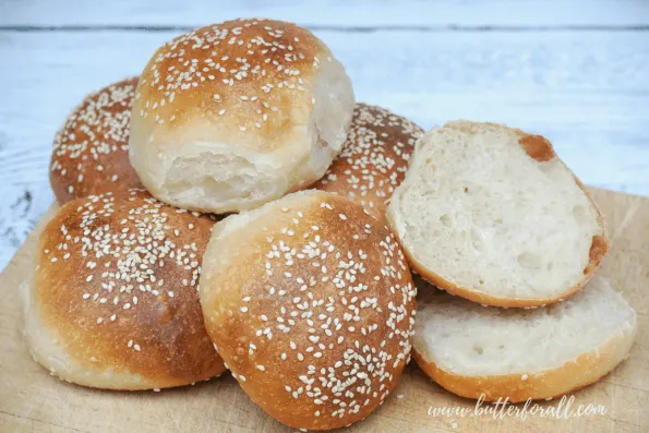 A close-up of stacked burger buns.