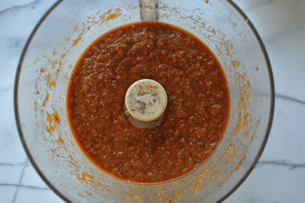 The marinade in a food processor bowl.