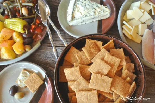 Crackers in a bowl on a table.