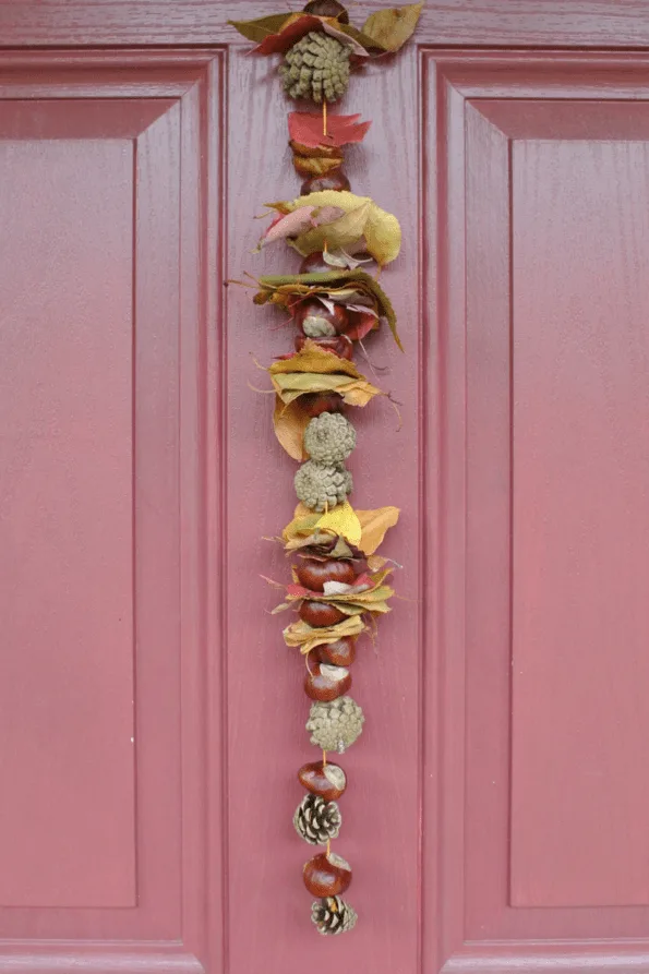 A autumn craft string on a door.