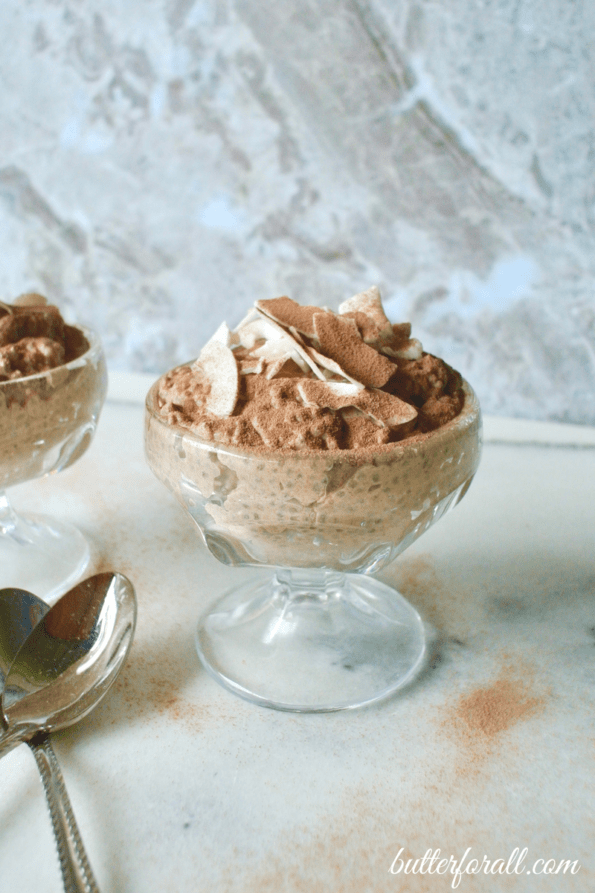 A bowl of chocolate coconut and almond chia seed pudding.