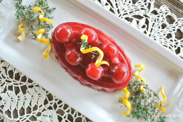 A molded lacto-fermented cranberry salad on a plate.