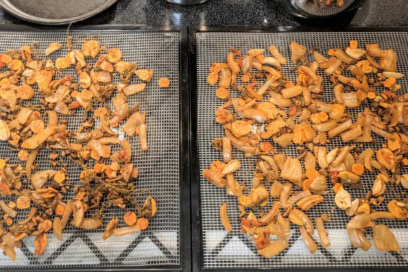 Fire cider spices drying on a dehydrator tray.