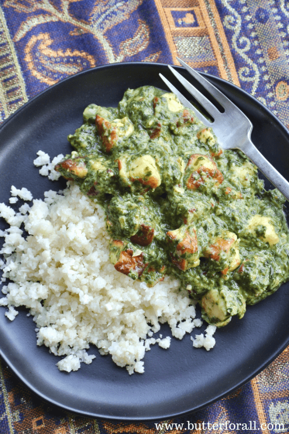 A plate of saag paneer with cauliflower rice.