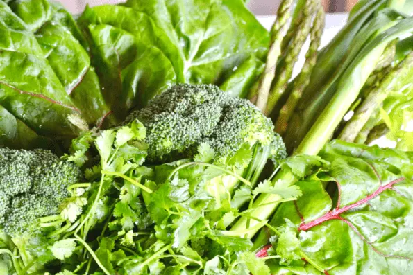 Fresh dark leafy greens for this detoxifying green goddess soup.