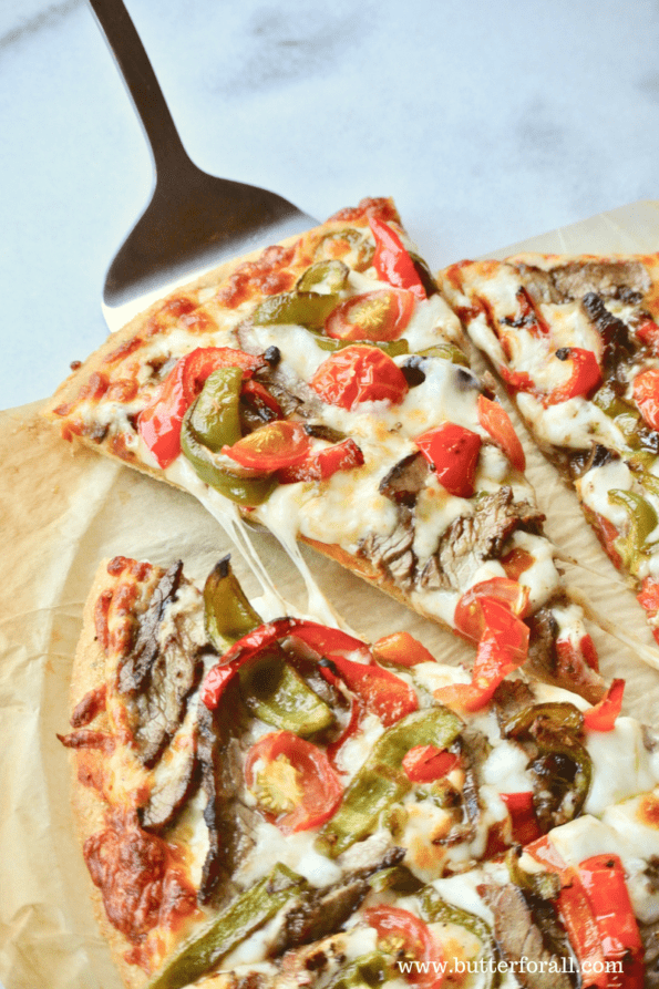 A perfect slice of sourdough and masa harina cornmeal pizza crust.