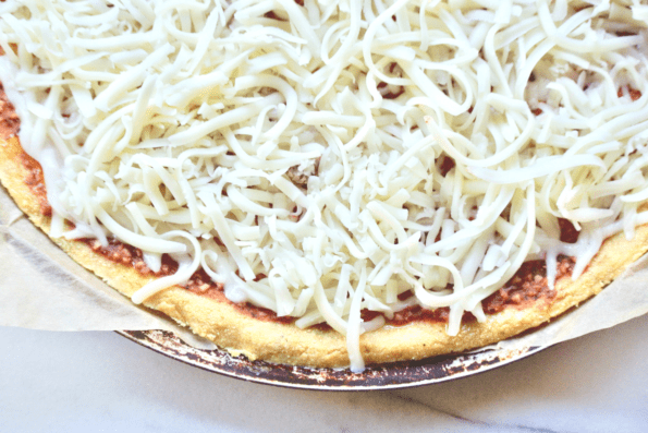Plenty of freshly grated mozzarella on a sourdough and masa harina cornmeal crust.