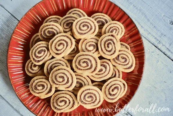These refined-sugar free, tart and buttery Cranberry And Sourdough Pastry Pinwheels are sure to become a holiday favorite!