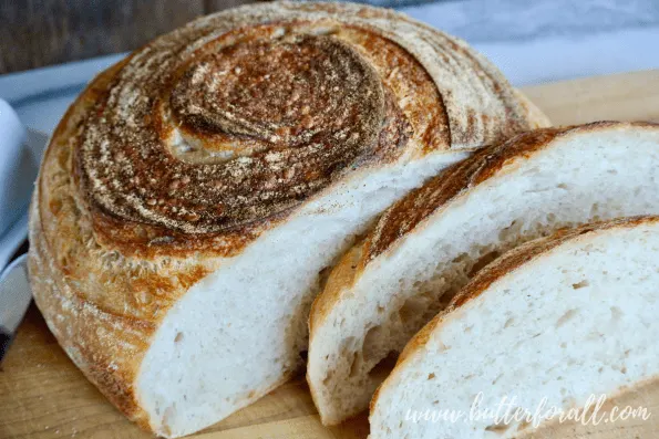 A soft artisan sourdough boule cut in thick slices perfect for toasting.