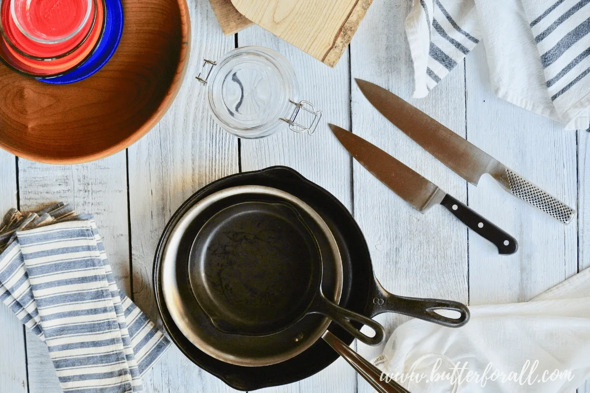 This guide to Sustainable Kitchen practices will help you make green choices in your kitchen. Learn how to ditch plastic and opt for more healthy longterm kitchen products and ideas. #greenhome #eco #kitchen #tools #castiron #stainlessteel #sustainability #green