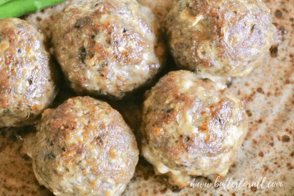 Perfectly browned meatballs hot from the oven.