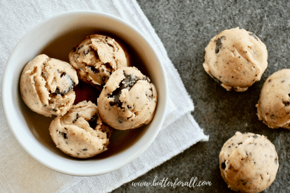 A bowl of soft chocolate chip cookie dough halva bites.