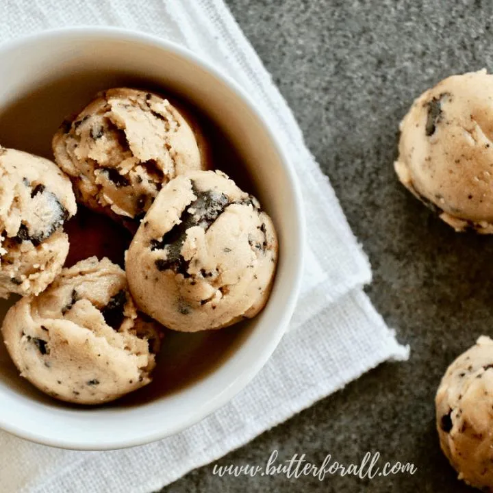 A bowl of soft chocolate chip cookie dough halva bites make the perfect healthy treat!