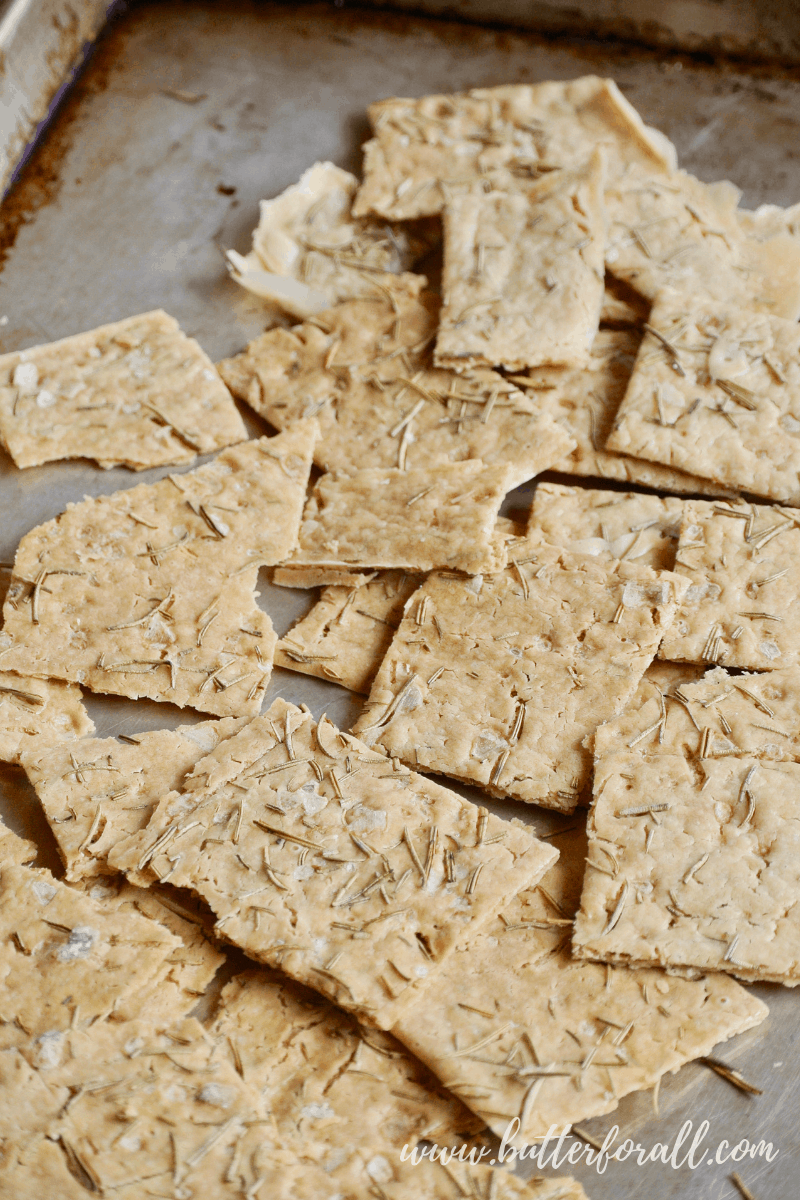 A pan of freshly baked sourdough discard crackers are super crunchy and flavorful.