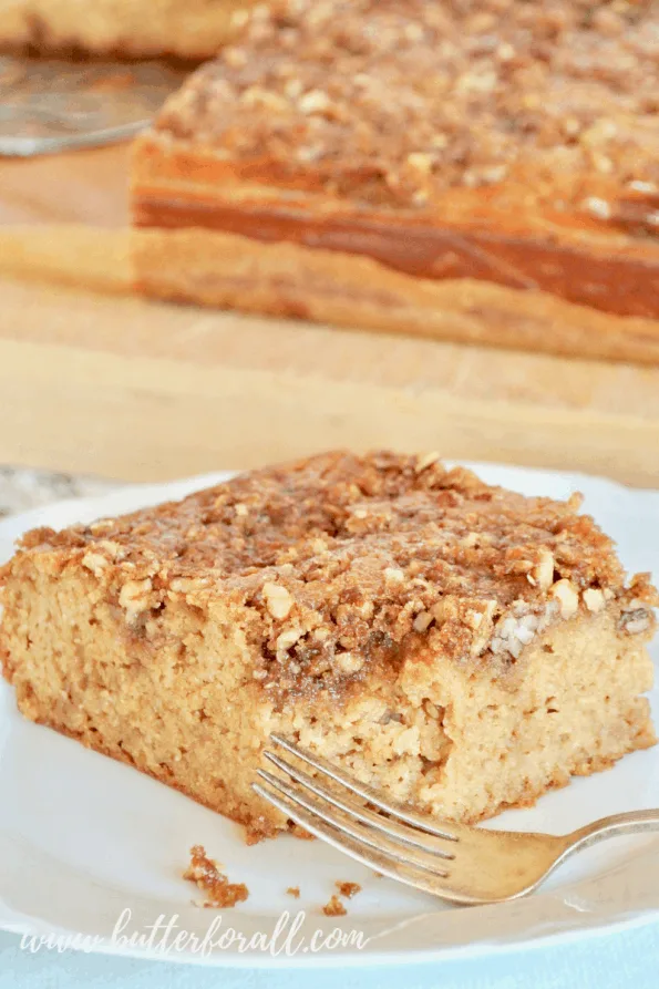 A slice of coffee cake with a crispy praline topping.