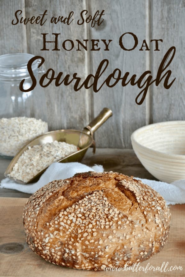 A loaf of honey oat sourdough bread with text overlay.