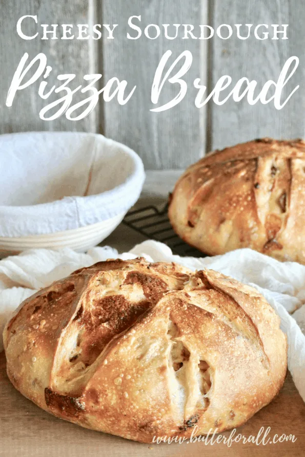 Cheesy sourdough pizza bread loaves with text overlay.