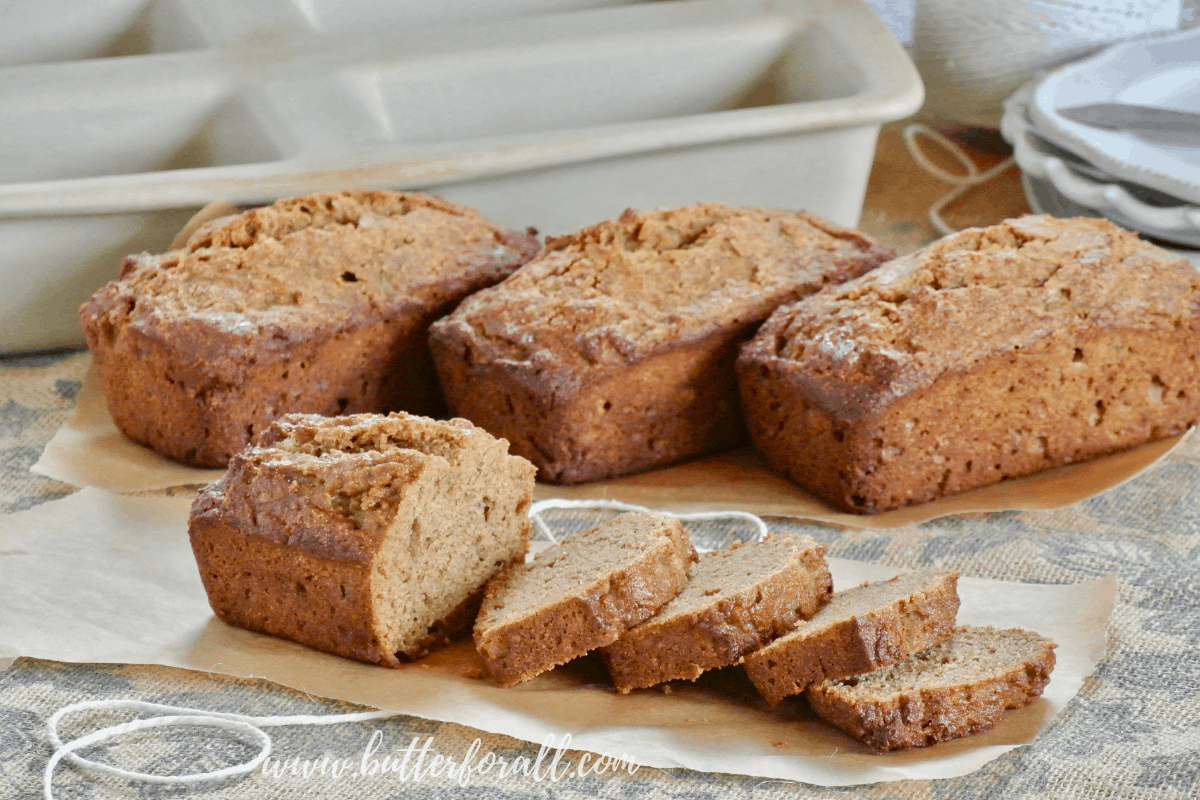 4 Perfect mini loaves of fresh baked sprouted wheat banana bread.