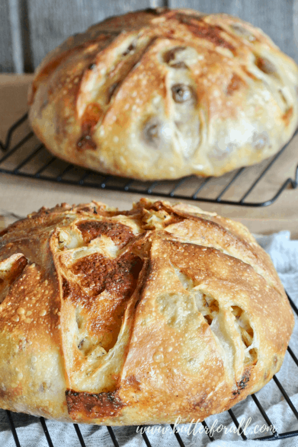 Two golden loaves of Cheesy Sourdough Pizza Bread fresh from the oven. #realfood #pizza #sourdough #Cheese #nourishingtraditions #wisetraditions #starter #bread