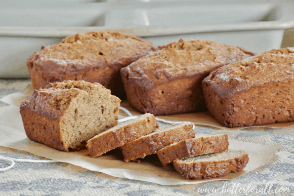 Four perfect mini loaves of fresh baked sprouted wheat banana bread. 