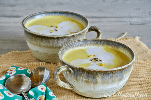 Two steaming bowls of super creamy Coconut Cauliflower Curry Soup. #keto #lowcarb #dairyfree #nourishing #realfood