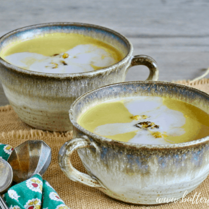 Two steaming bowls of super creamy Coconut Cauliflower Curry Soup. #keto #lowcarb #dairyfree #nourishing #realfood