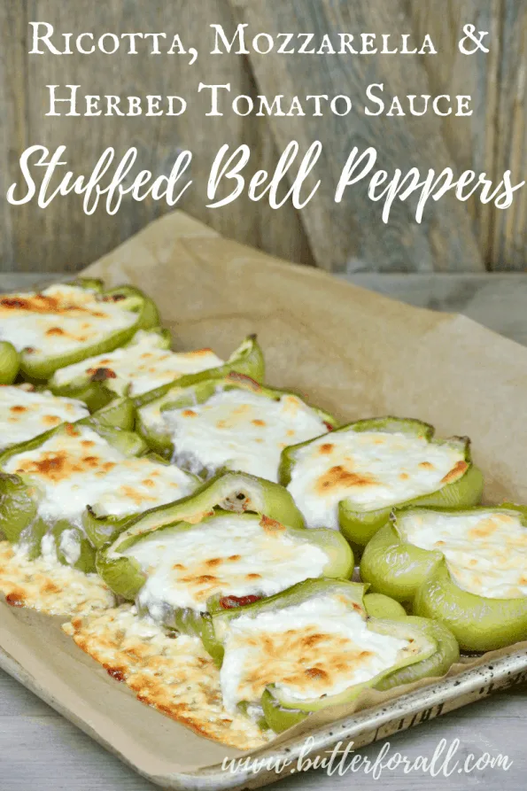 A tray of stuffed peppers with text overlay.