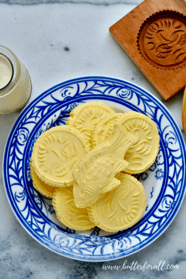 A plate of fresh raw butter pats.