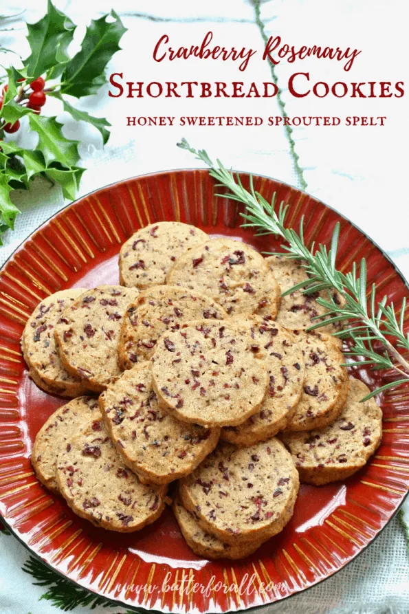 A plate of cranberry rosemary shortbread cookies with text overlay.