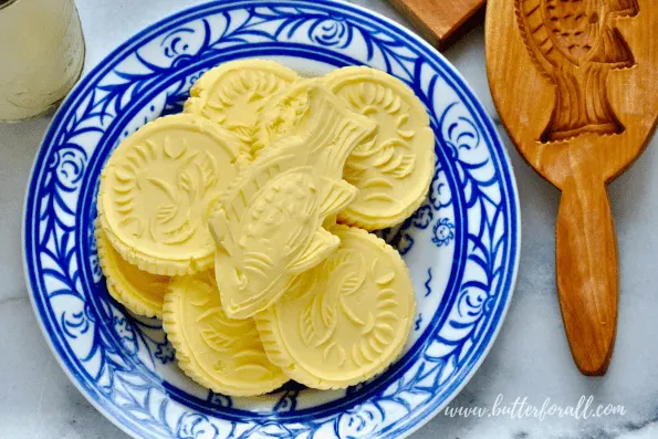 A plate of fresh butter pats.