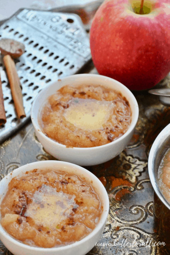 Bowls of hot buttery apple sauce.