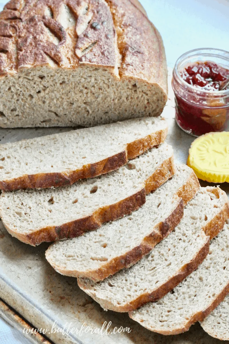 The perfect ratio for creating a whole wheat sourdough loaf that doesn't feel like a brick! This recipe make a loaf with an open crumb and perfect whole wheat texture. #starter #sourdough #wholewheat #wholegrain #wildyeast #bread #honey