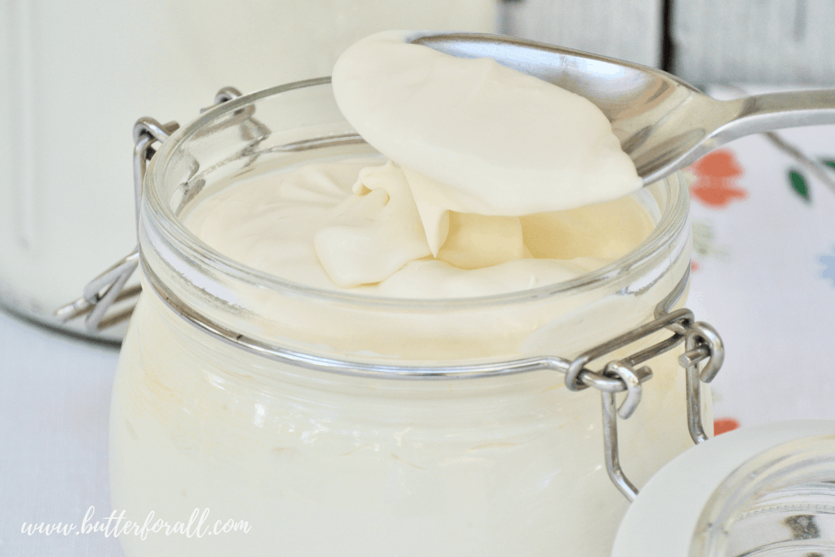 A jar of sour cream from raw cream.