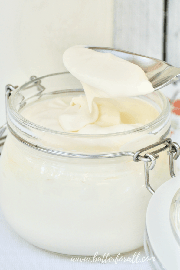 A jar of raw sour cream.