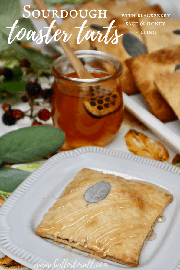 A Pinterest image showing a golden-brown whole tart and a jar of honey with text overlay. 