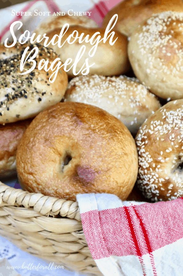Pinterest image of a basket of soft and chewy sourdough bagels with text overlay.