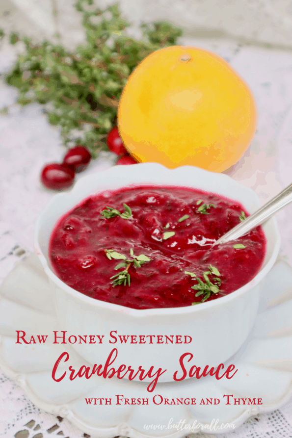 Pinterest image showing one bowl of fresh, bright red cranberry sauce with a text overlay.